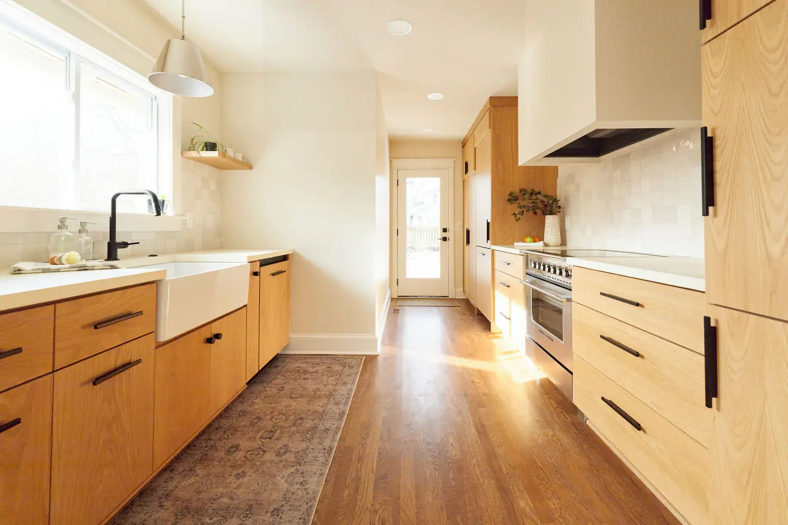 Natural hardwood floors in the remodeled Robinson home kitchen