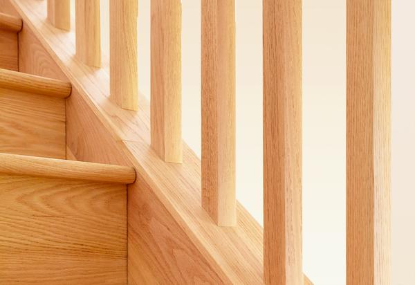 Hardwood stairs with black railings