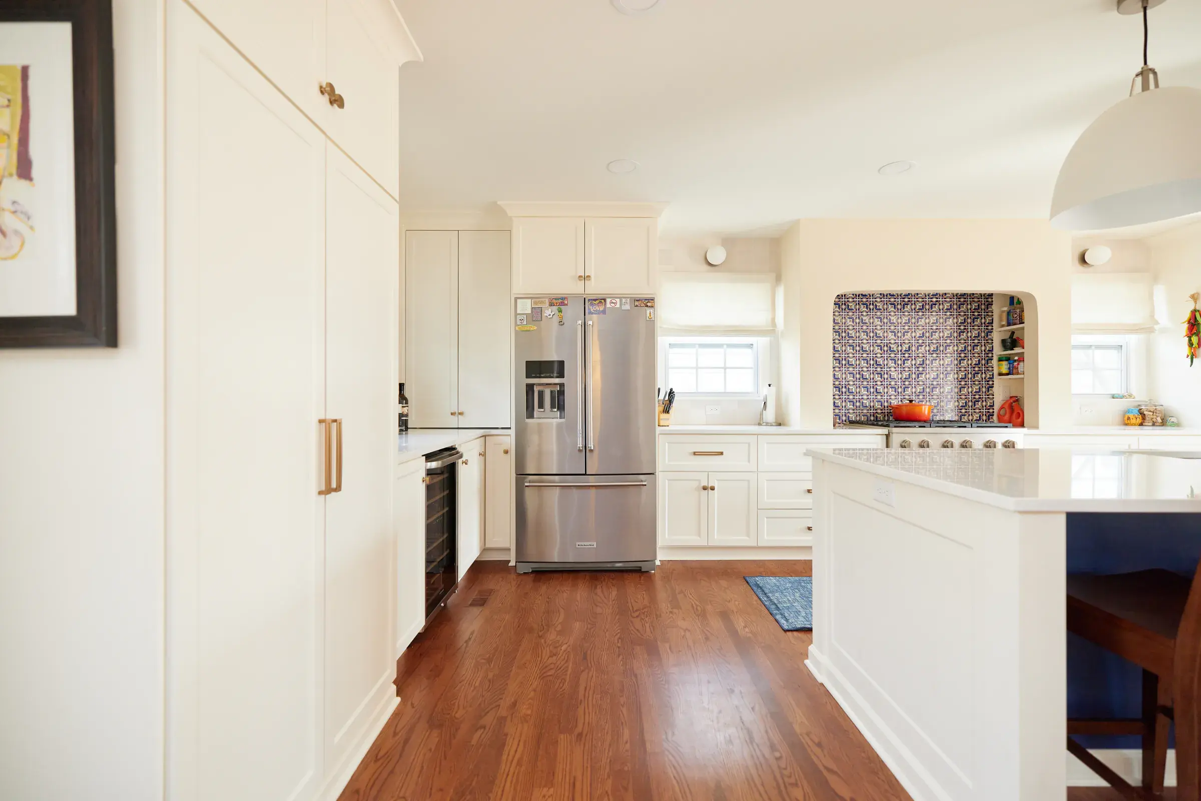 Warm hardwood flooring running through the Guillen home kitchen