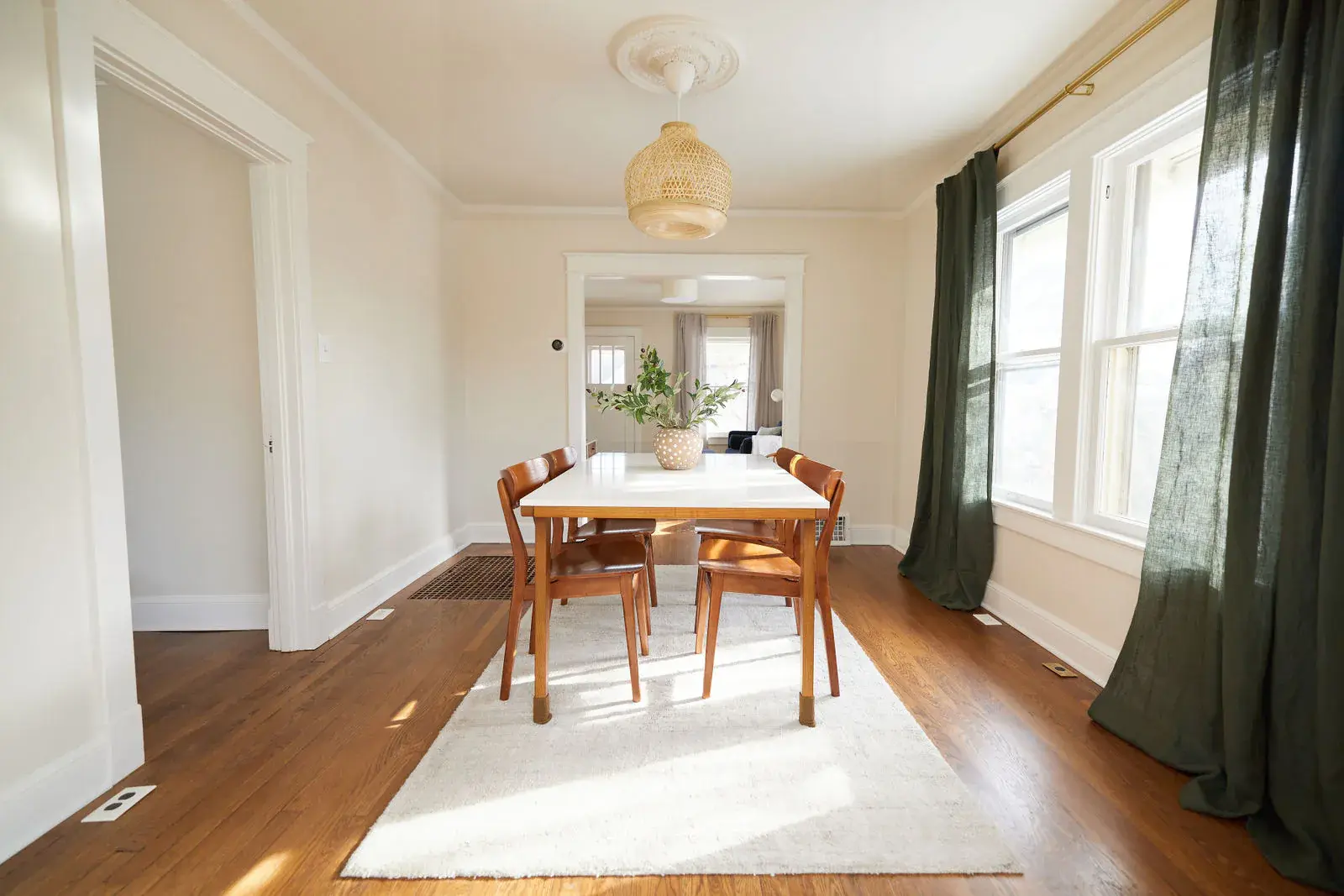 Natural hardwood floors extending through the Robinson home dining room